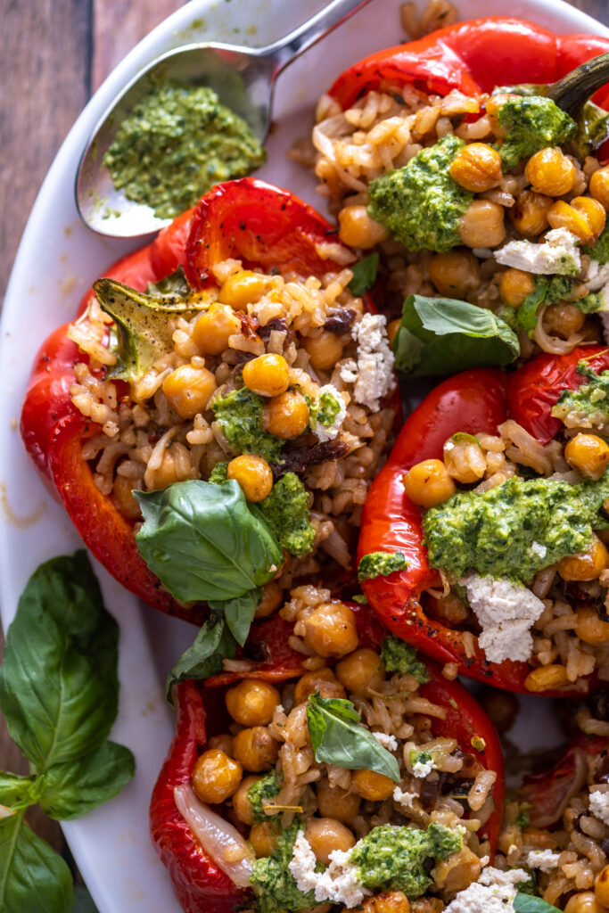 vegan Italian stuffed peppers with sun-dried tomatoes and sunflower basil pesto