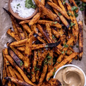 smoky oven baked sweet potato fries with maple tahini sauce