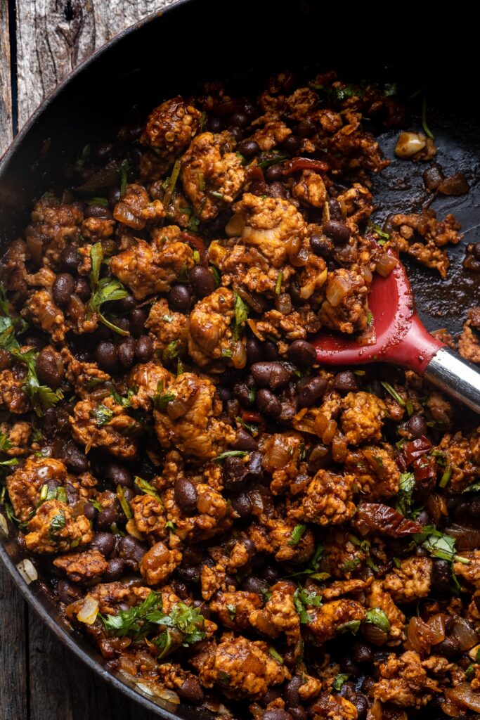 Chipotle Chicken Stuffed Poblano Peppers with Pumpkin Seed Crema