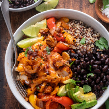 Chipotle baked cod with jammy peppers